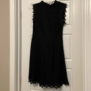 Francesca’s black lace open back dress size US medium